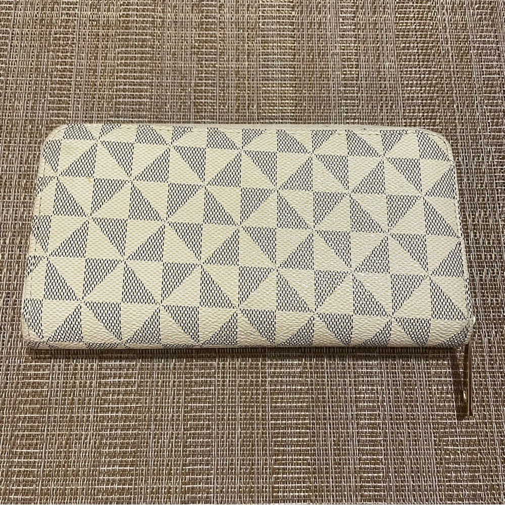 Damien geometric patterned zip around wallet